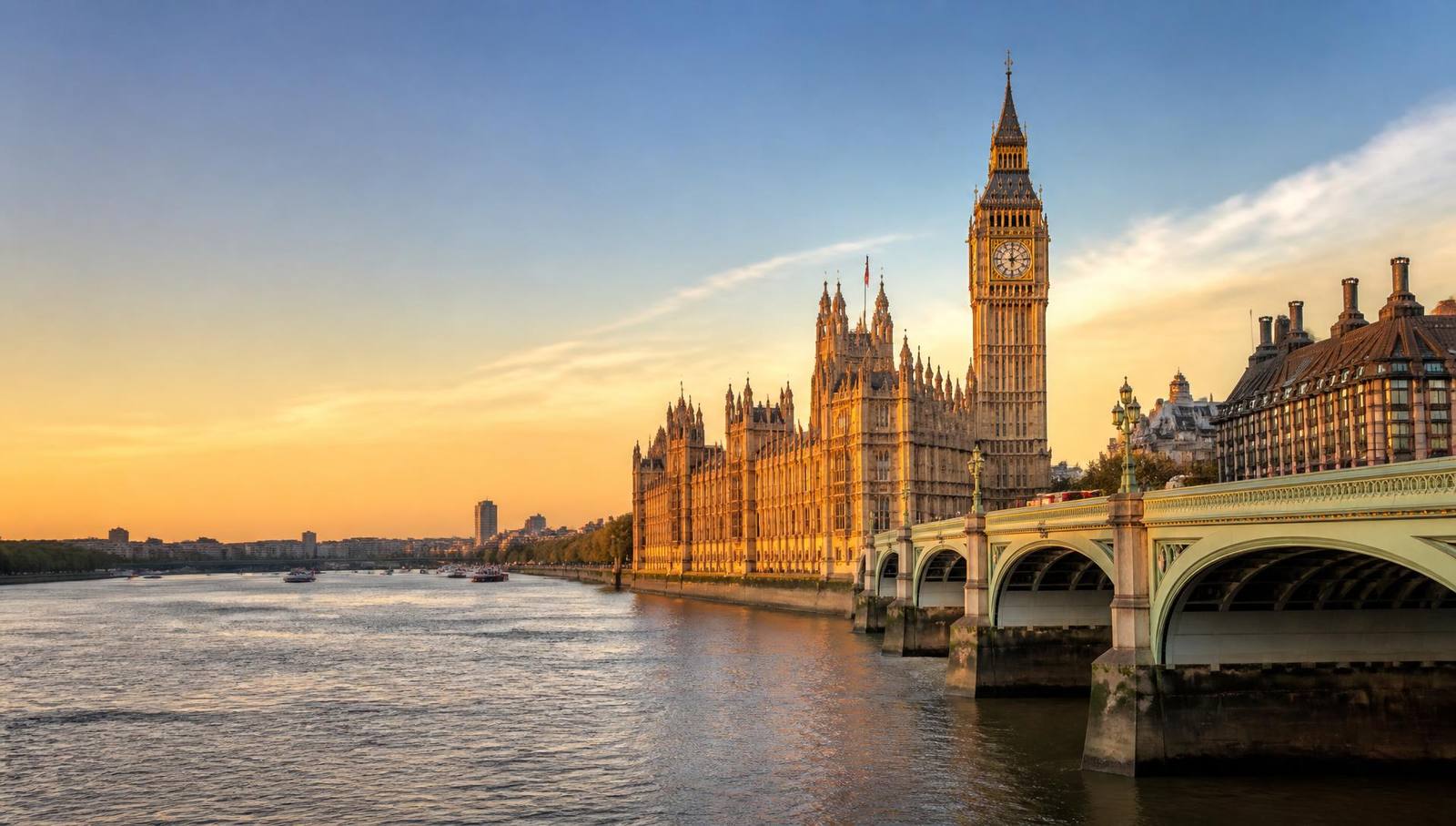 The Houses of Parliament and Westminster Bridge in London at sunset